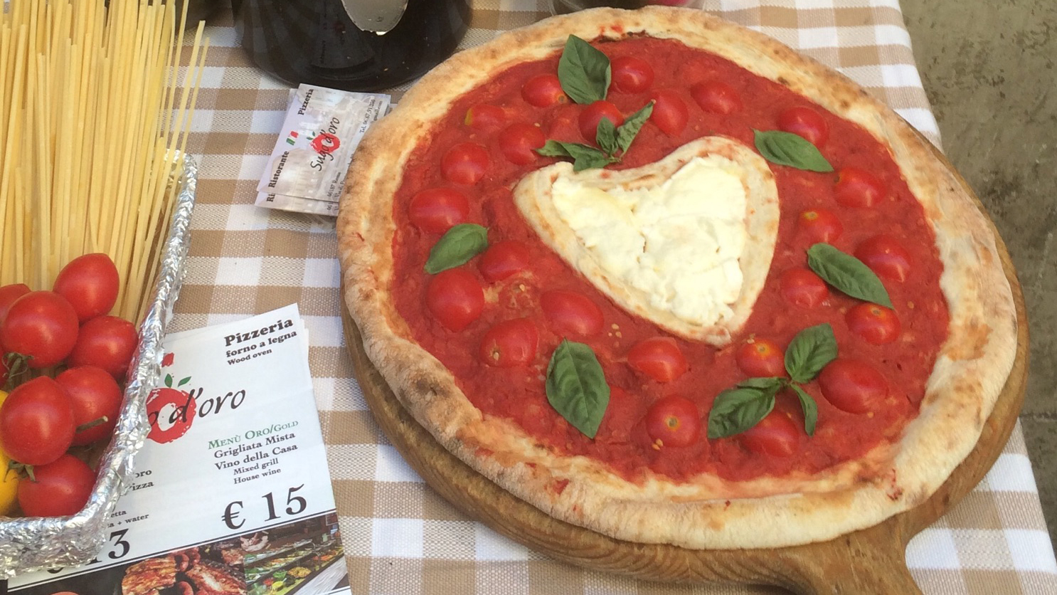 Photo of heart-shaped pizza in Rome restaurant