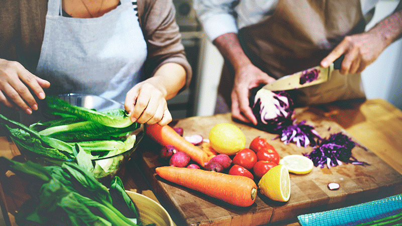 Coupe chop vegetables on cutting board