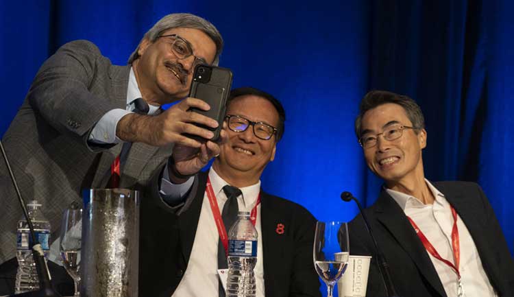 BCVS Program Chair Sumanth Prabhu, MD, American Heart Association President Joe Wu, MD, PhD, and Jianyi Zhang, MD, PhD, chair of the BCVS Council, pose for a selfie during BCVS 23.