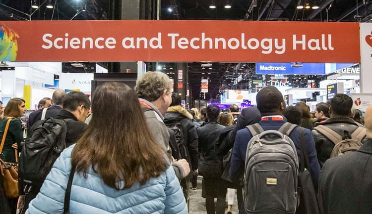 Attendees enter the science and technology hall.