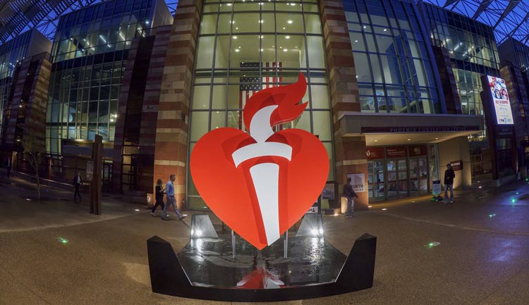The American Heart Association Heart and Torch Logo on display at the Phoenix Convention Center during ISC 2024.