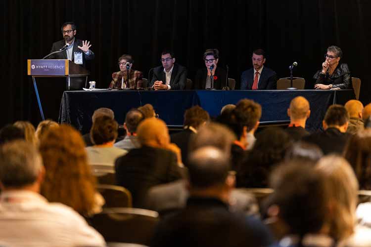 Audience members listen to one of the main speakers from ReSuscitation Science Symposium 2022 in Chicago, Illinois.