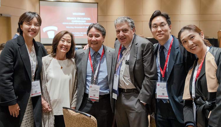 Attendees smile for a picture at the Clinical Cardiology Council Annual Business Dinner in 2022.
