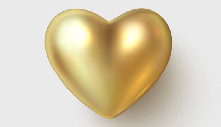 A gold metallic 3-dimensional heart.