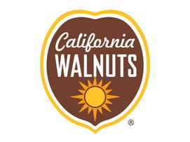 Image of logo, featuring a walnut, sun, and the words California Walnuts