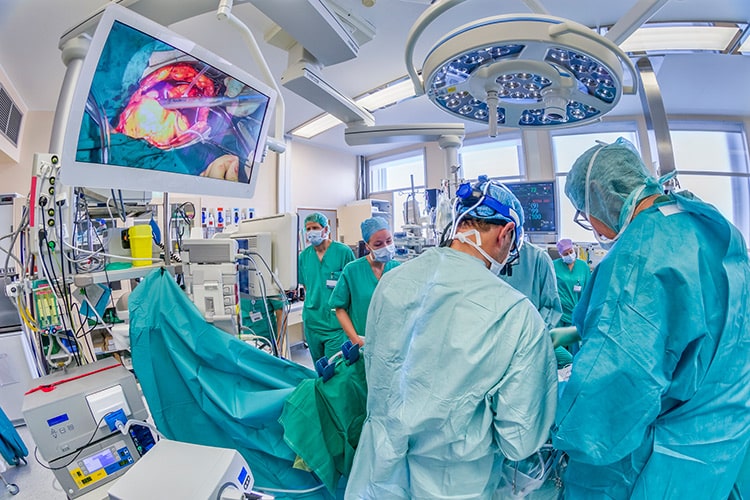 Cardiac Surgeons and Nurses in the Operation Room for a heart valve replacement surgery, operating room, Reykjavik, Iceland.
