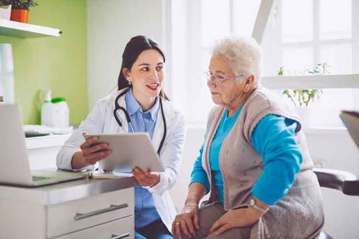 doctor consulting her senior female patient