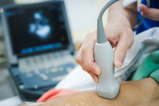 Doctor is examining heart's patient by echocardiogram for diagnosis disease or explain symptom.