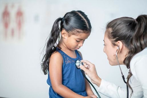 girl has a doctors checkup