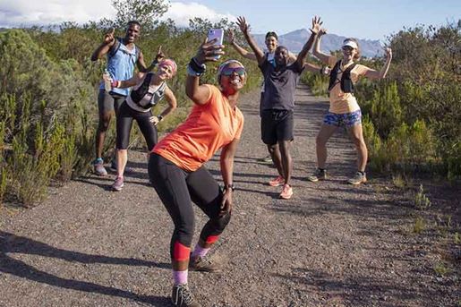 group of hikers taking selfie