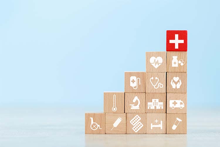 Health Insurance Concept Hand Arranging Wood Block Stacking With Icon Healthcare Medical