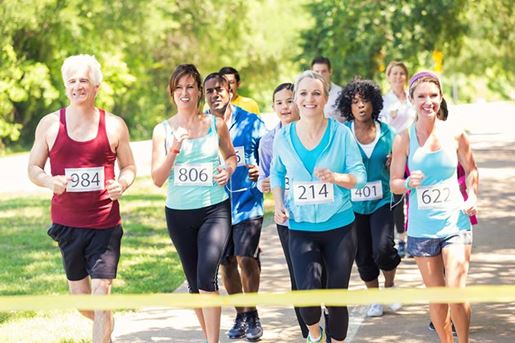 Runners approaching finish line during marathon or 5k race