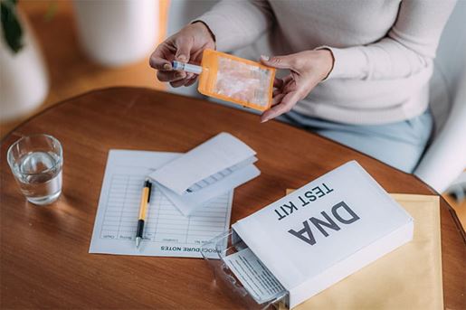 senior woman preparing dna test kit