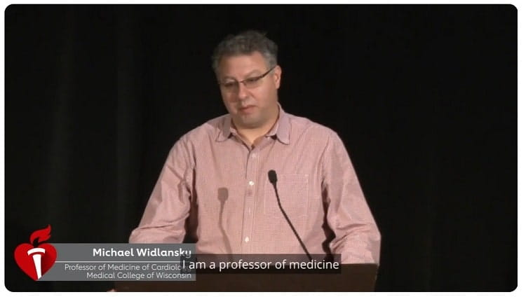Dr. Widlansky standing at a podium