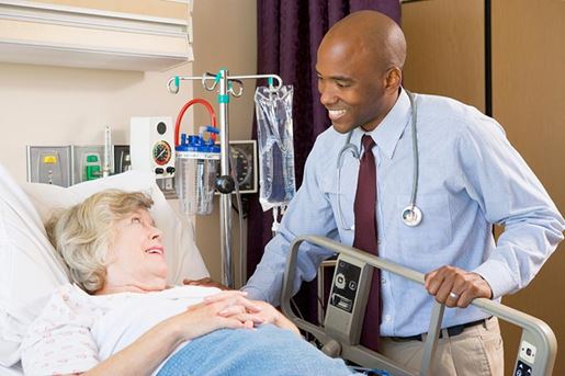 doctor talking to senior woman