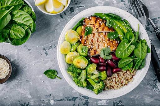 healthy, low cholesterol lunch with salad, fish, and olives