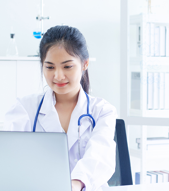 doctor at her laptop