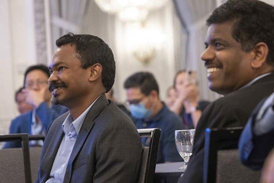 2022 attendees at the Asian Cardiovascular Symposia share a laugh at the awards dinner/