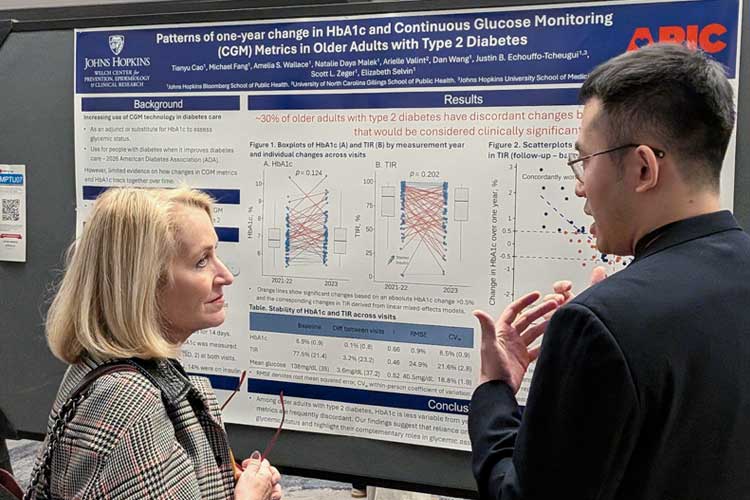 AHA President Stacey E. Rosen, MD, FAHA, speaks with a scientist about their poster presentation at EPI|Lifestyle 2026 on March 17, 2026.