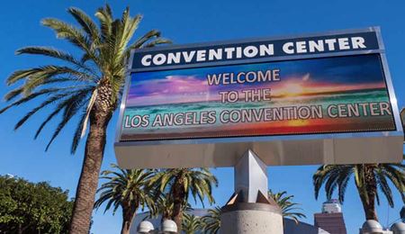 An electric sign welcomes visitors to the Los Angeles Convention Center.