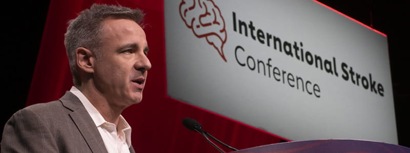 A speaker addresses the audience during the Opening Main Event at #ISC25.