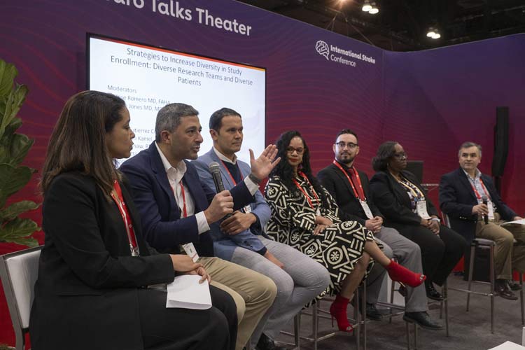 A panel discusses ways to increase diversity in study enrollment in the Neuro Talk Theatre during #ISC25.