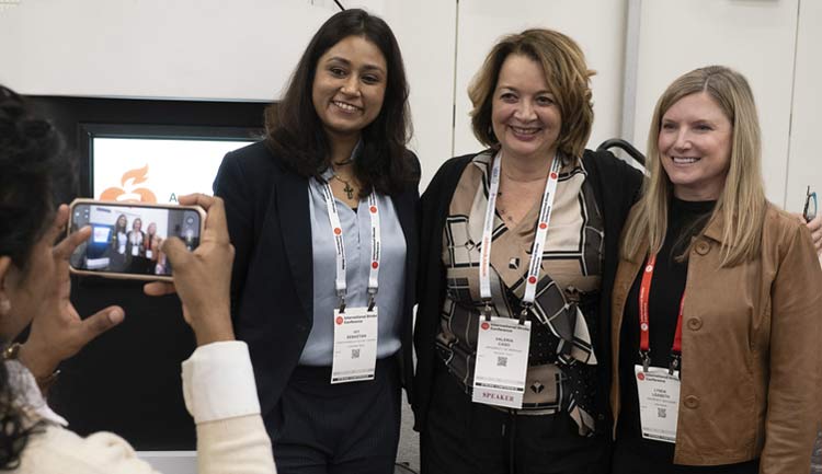 Attendees pose for a photo during a break in programming at the HEADS-UP Pre-Conference Symposium, at ISC26.