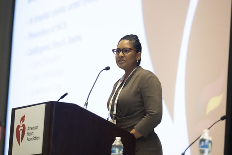 A speaker gives her presentation during #ReSS24 in Chicago.