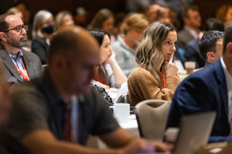 #ReSS22 attendees watch during the opening session.