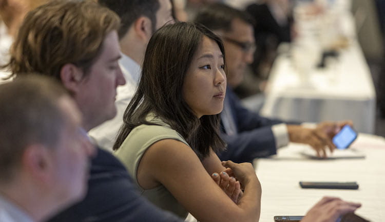 ReSS 2024 attendees listen carefully to the opening session in Chicago.