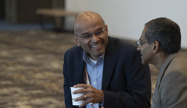 Two attendees share coffee and a laugh on Friday, Nov. 7, 2025. the first day of Scientific Sessions 2025 in New Orleans, Louisiana.