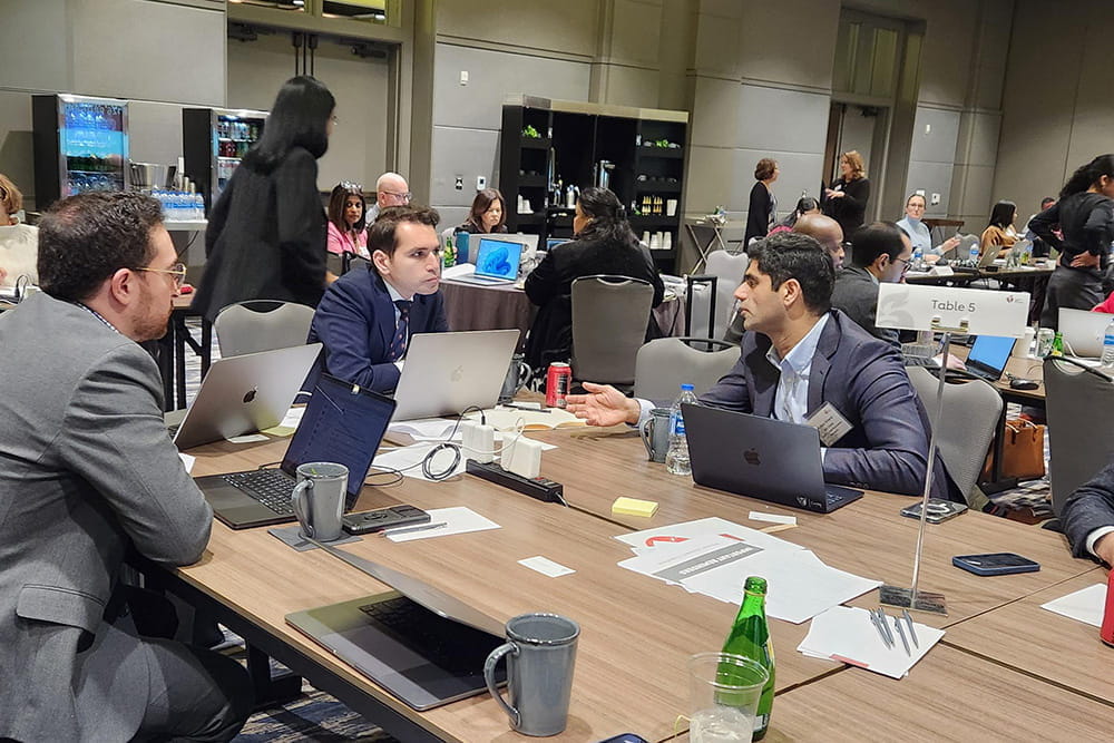 Group photo of table number 5 volunteers working to plan SS26 during this year's CSSP, February 2026.