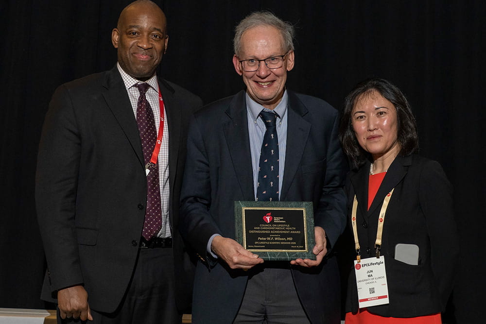 Peter W.F. Wilson, MD, receiving the Distinguished Achievement Award during EPI|Lifestyle26 in Boston, Massachusetts.