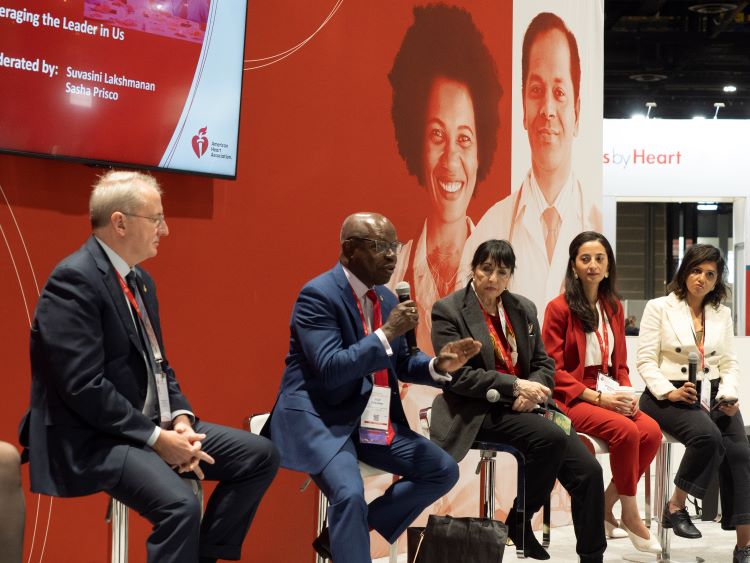 A diverse panel leads a discussion during an American Heart Association scientific conference.