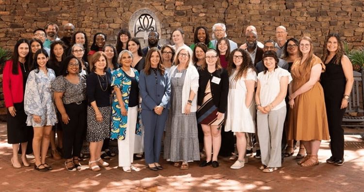 Network awardees gather for an annual collaboration meeting. Group photo of the network awardee teams