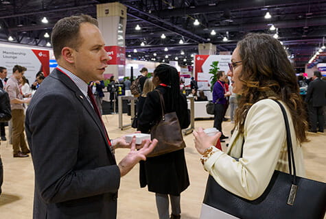 Researchers at Heart - Scientific Sessions - man and woman talking