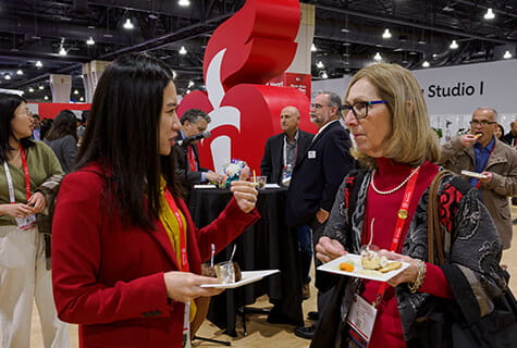 Researchers at Heart - Two women talking 