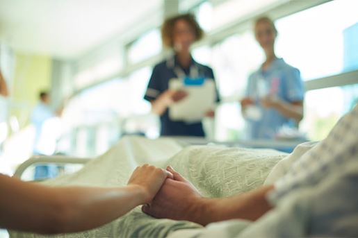 patient comforted in bed